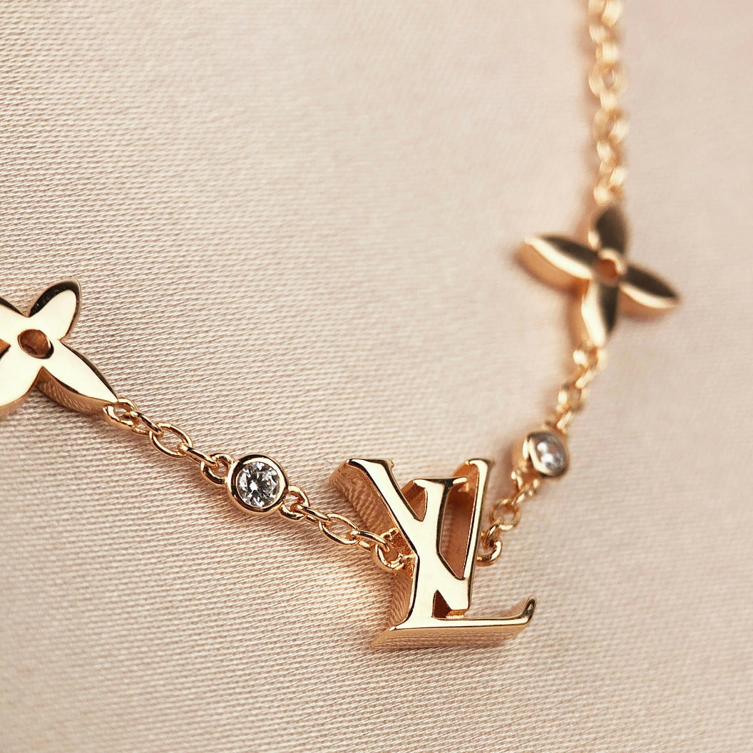 [Charm Aries Jewelry]STAR AND SUN 7 MOTIFS GOLD BRACELET
