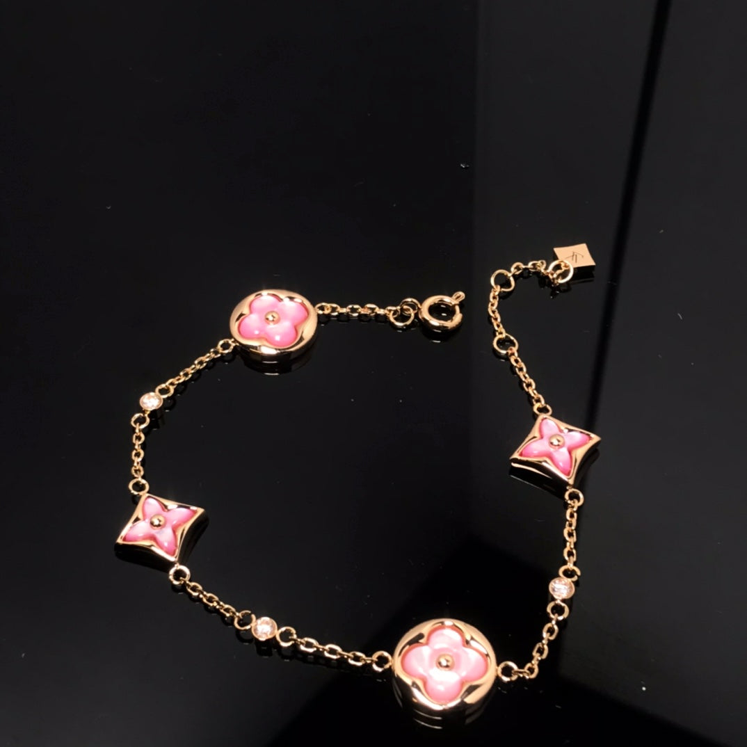 [Charm Aries Jewelry]STAR AND SUN 4 MOTIF PINK MOP PINK GOLD BRACELET