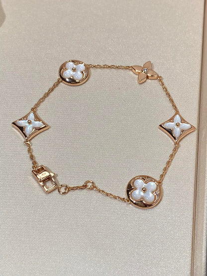[Charm Aries Jewelry]STAR AND SUN 5 MOTIF MOP PINK GOLD BRACELET