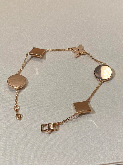 [Charm Aries Jewelry]STAR AND SUN 5 MOTIF MOP PINK GOLD BRACELET
