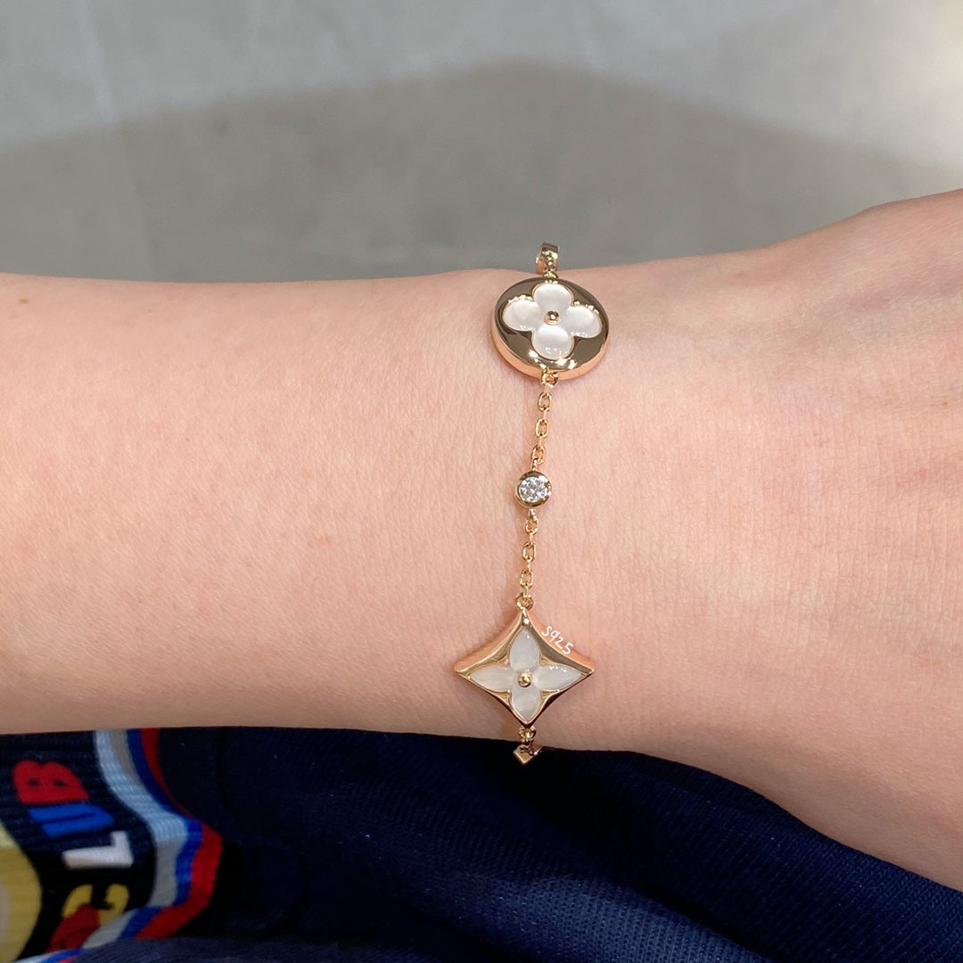 [Charm Aries Jewelry]STAR AND SUN 4 MOTIF WHITE MOP PINK GOLD BRACELET