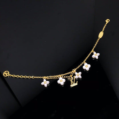 [Charm Aries Jewelry]LOGO 6 MOTIF STAR AND SUN GOLD BRACELET
