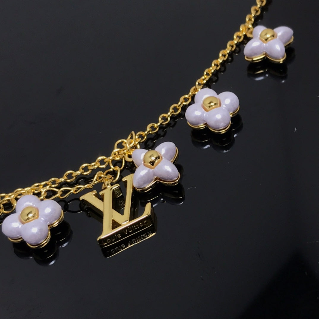 [Charm Aries Jewelry]LOGO 6 MOTIF STAR AND SUN GOLD BRACELET