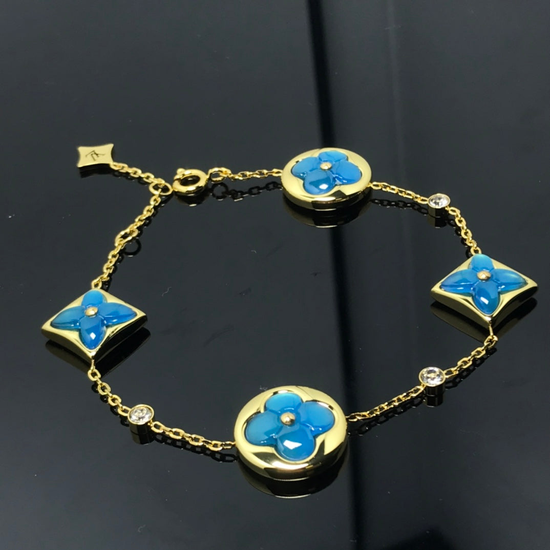 [Charm Aries Jewelry]STAR AND SUN 4 MOTIF BLUE BRACELET